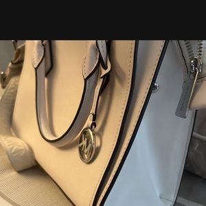 Michael Kors White bag comes with two different cross straps!